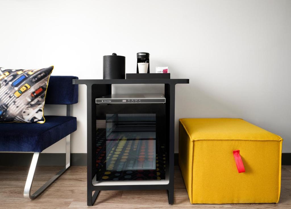 Queen Room with Two Queen Beds Mobility and Hearing Accessible Transfer Shower