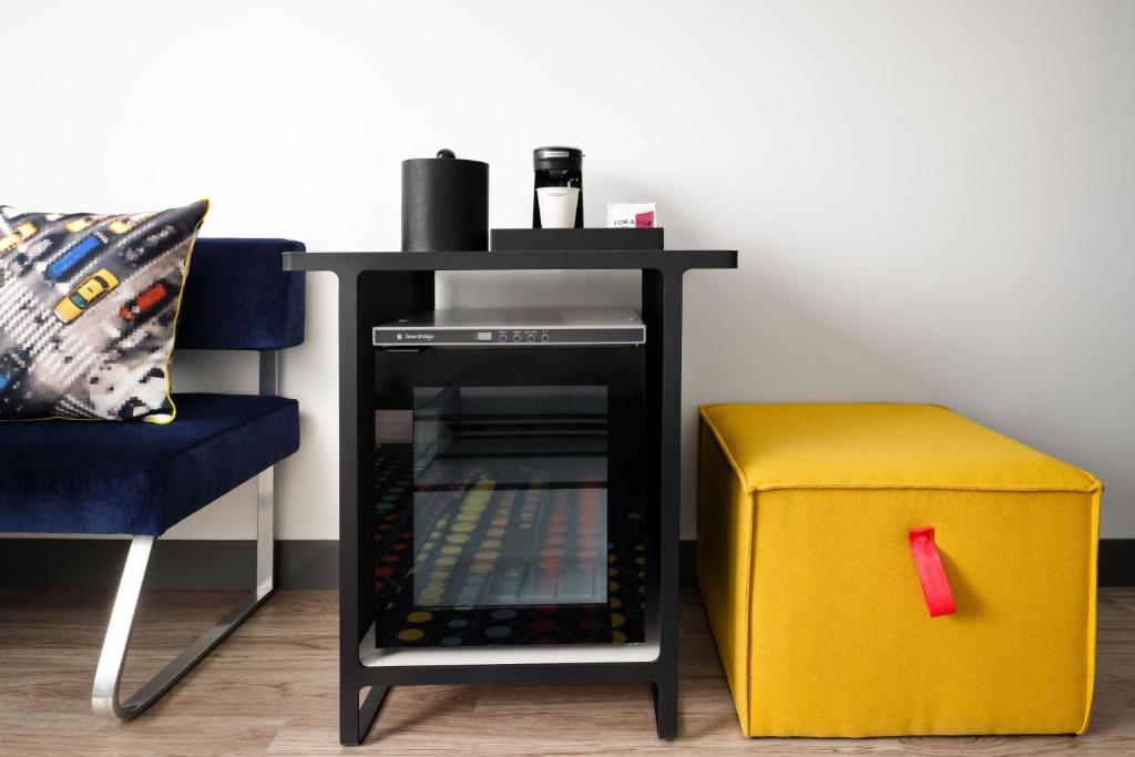 Queen Room with Two Queen Beds Mobility and Hearing Accessible Transfer Shower