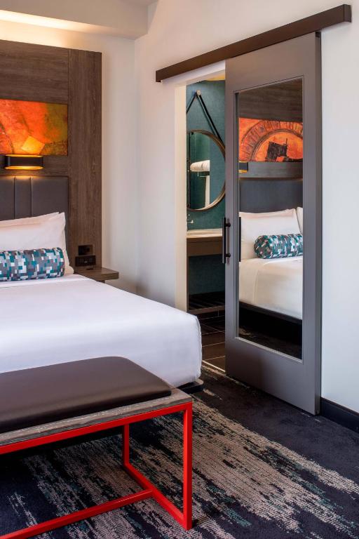 Corner Double Room with Two Queen Beds and City View