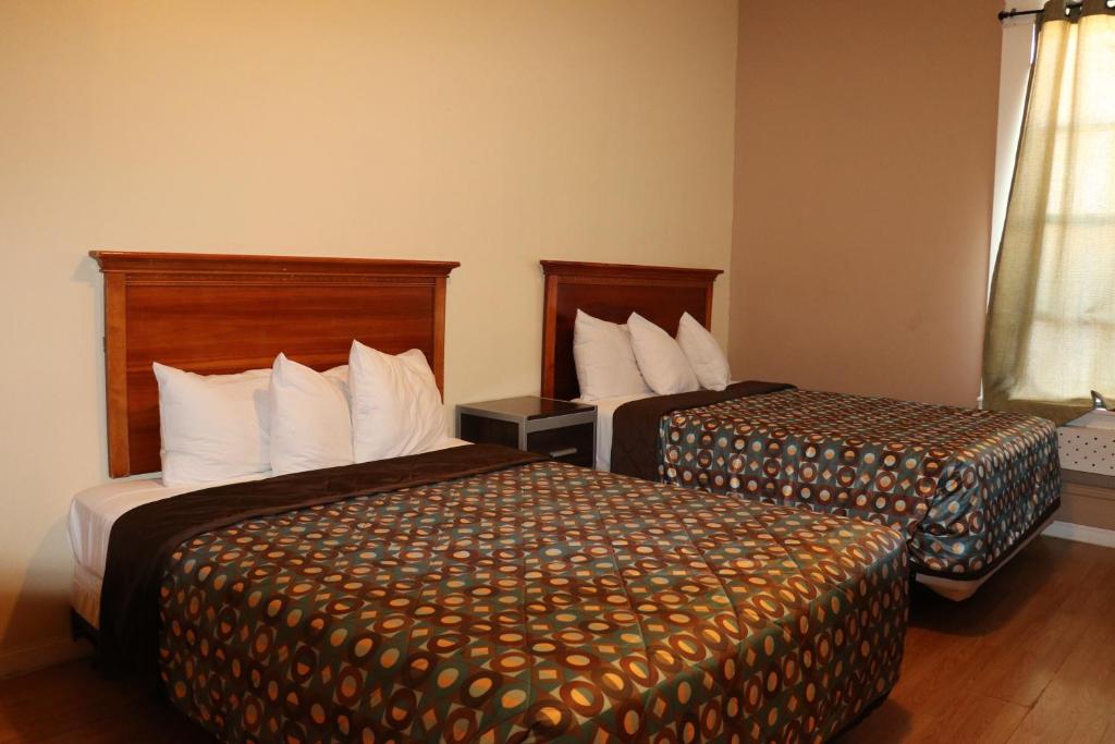 Double Room with Two Double Beds and Private Bathroom