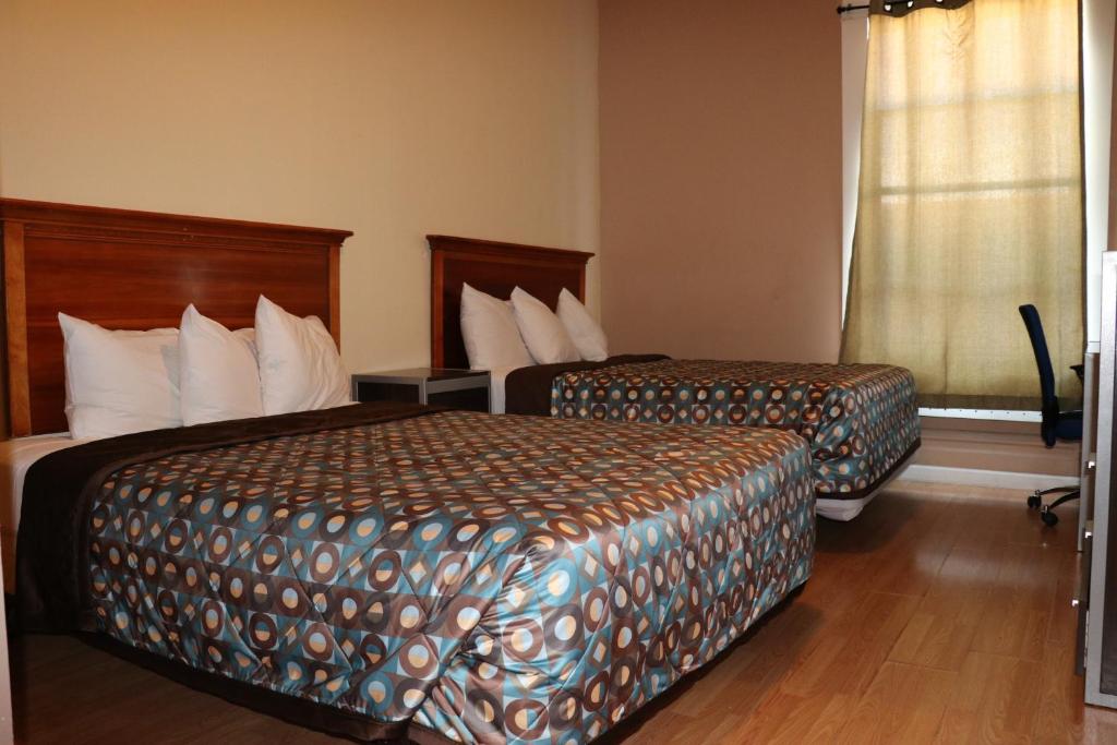 Double Room with Two Double Beds and Private Bathroom