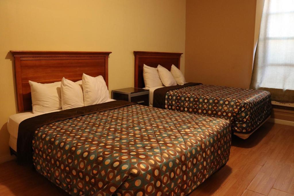 Double Room with Two Double Beds and Private Bathroom