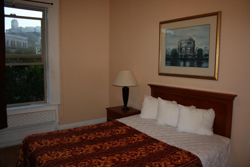 Queen Room with Shared Bathroom