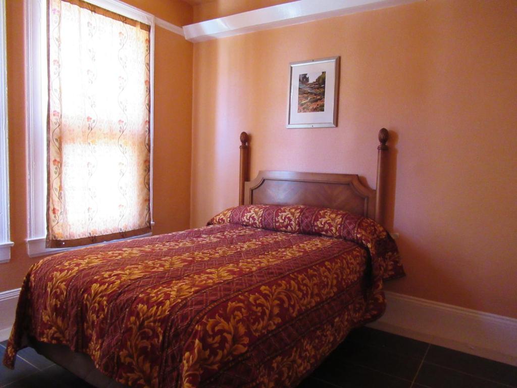 Queen Room with Shared Bathroom