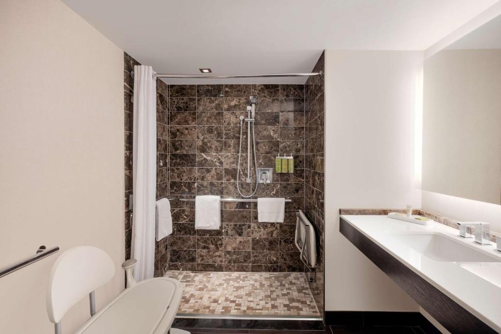 Double Room with Two Double Beds – Mobility Accessible with Roll in Shower