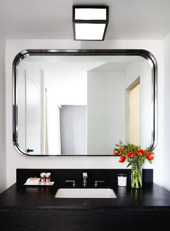 Double room with two double beds balcony and city view