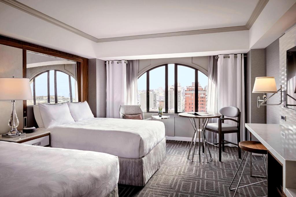 Guest Room with Two Queen Beds and City View