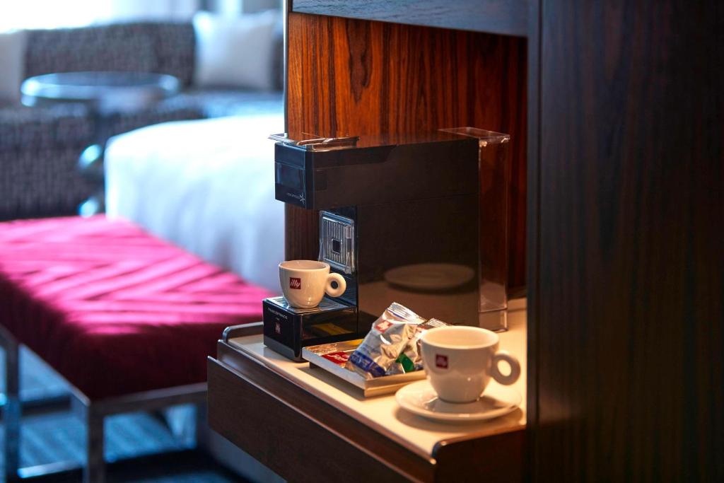 Guest Room with Two Queen Beds and City View