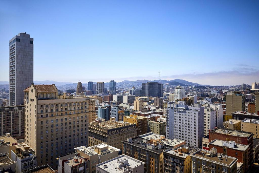 Guest Room with Two Queen Beds and City View