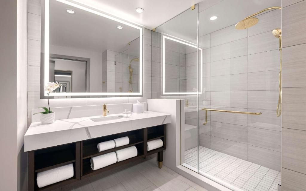 Deluxe Queen Room with Two Queen Beds and Partial Strip View