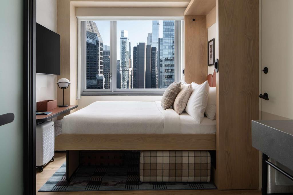 Flex Room with Wall Bed and City View