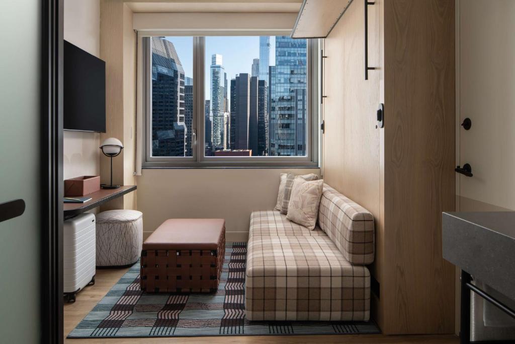 Flex Room with Wall Bed and City View