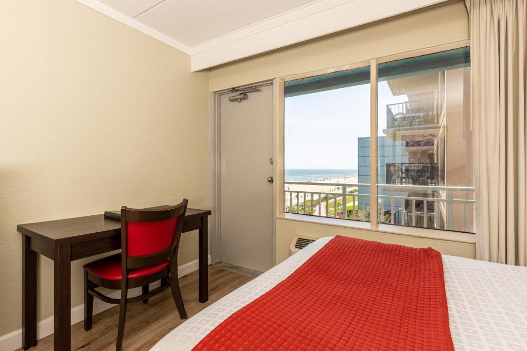 Room with Two Double Beds – Partial Ocean View
